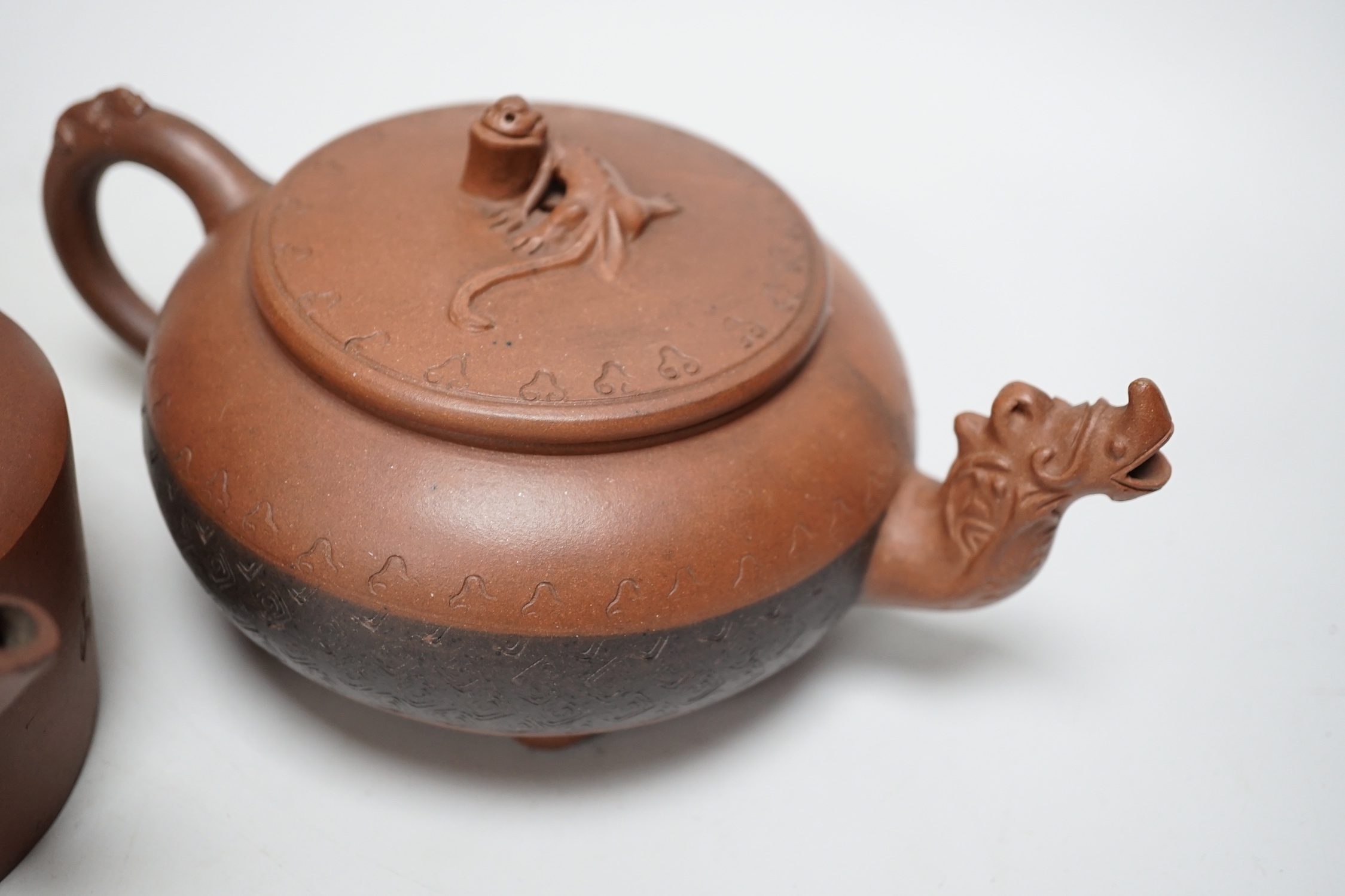 Five early 20th century Chinese Yixing teapots, widest 20cm